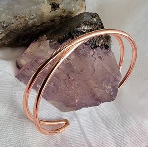 Rose gold plated criss cross bracelet